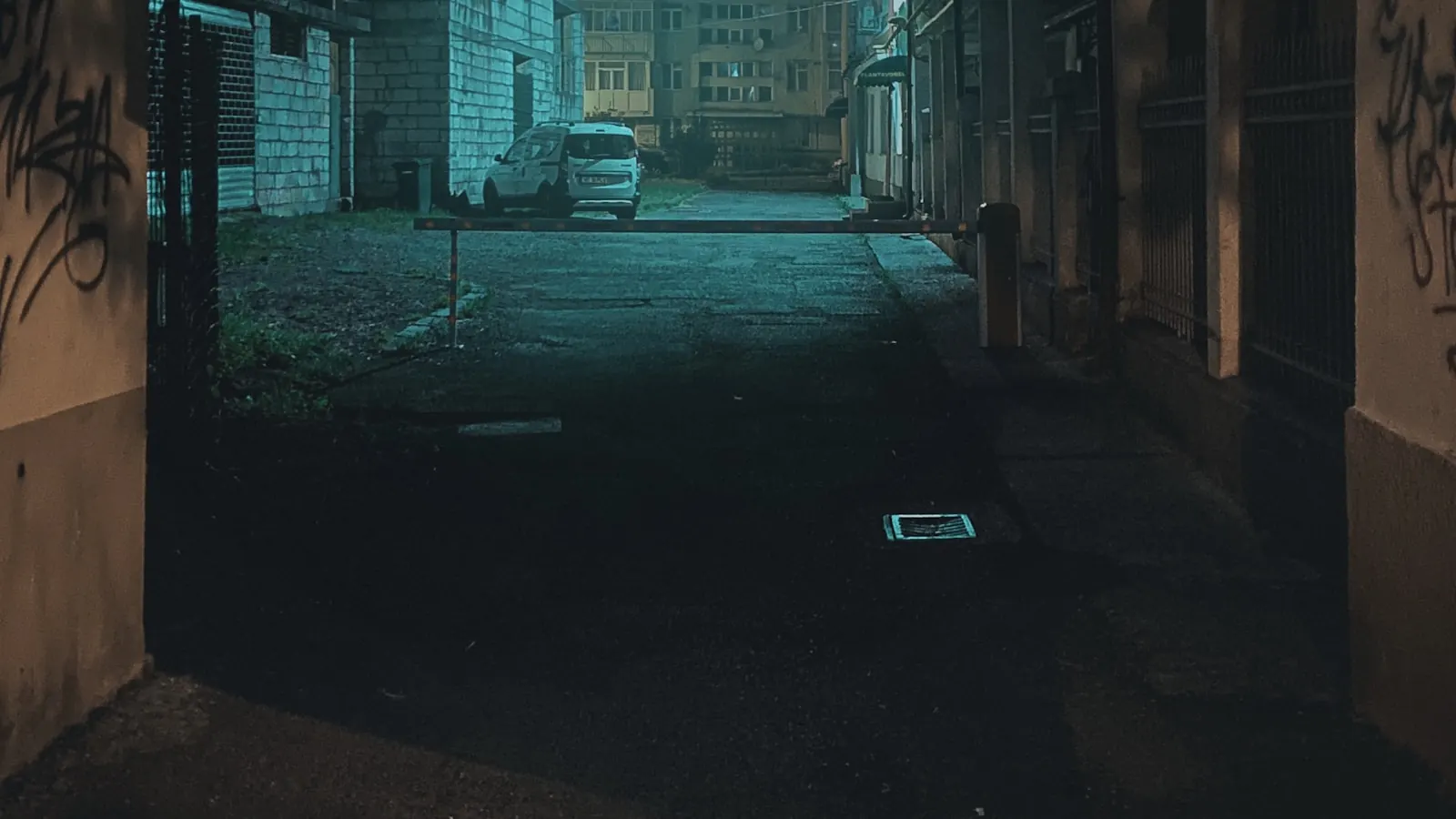 A dim hallway light on at night, the kind you switch on for the walk to the bathroom.
